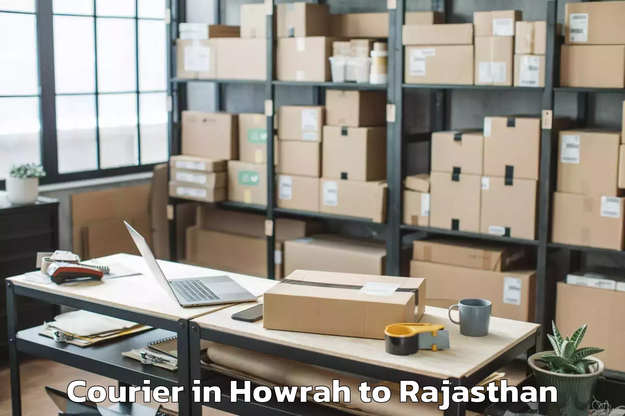 Book Howrah to Bagar Courier Online